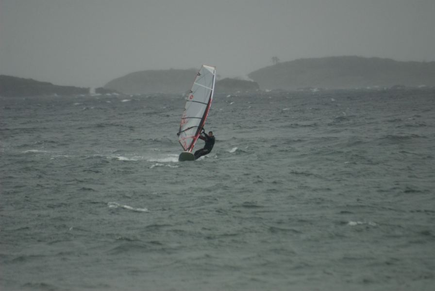 check out the spray breaking right over the island right of the sail
