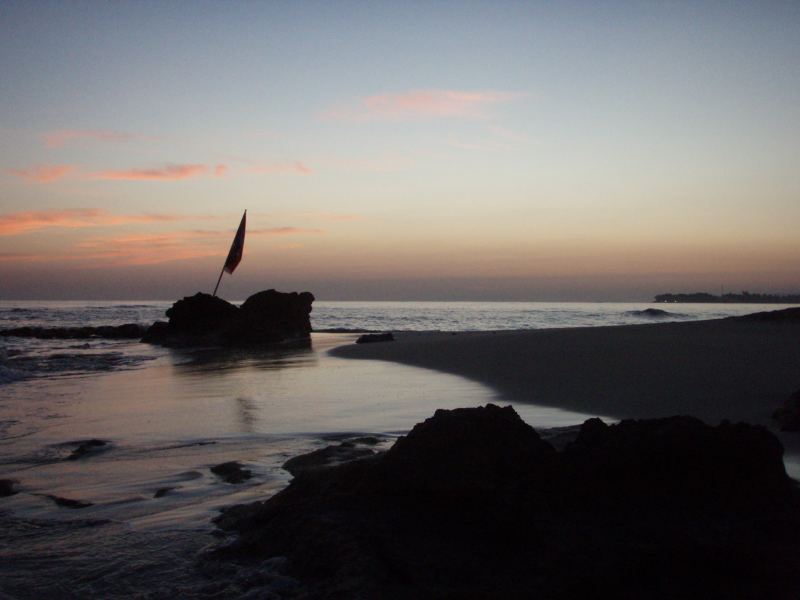 The point in early morning
Walking on the beach,as the water laps over your feet,you can feel the heat of the previous day.the air is cool,and the sea is warmer,the sun is just coming up in Paradise.
