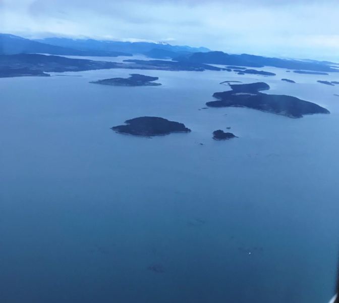 Kelp Reef Weather Station
Picture of the currently non-operational (Jan 2018) Kelp Reef weather reporting station (Itâ€™s the white dot on the bottom right). Determining the wind at Islandview Beach (upper left) is typically 1/2 the wind between Kelp and Vic Airport. Or take the MM5 â€œPredicted1â€ winds and subtract 3-5 knots. James Island on left back, Sidney Island (and Spit) on the back right and Dâ€™Arcy Island in the foreground.  You can see all the kelp surrounding the reef - thus the name - doh!
